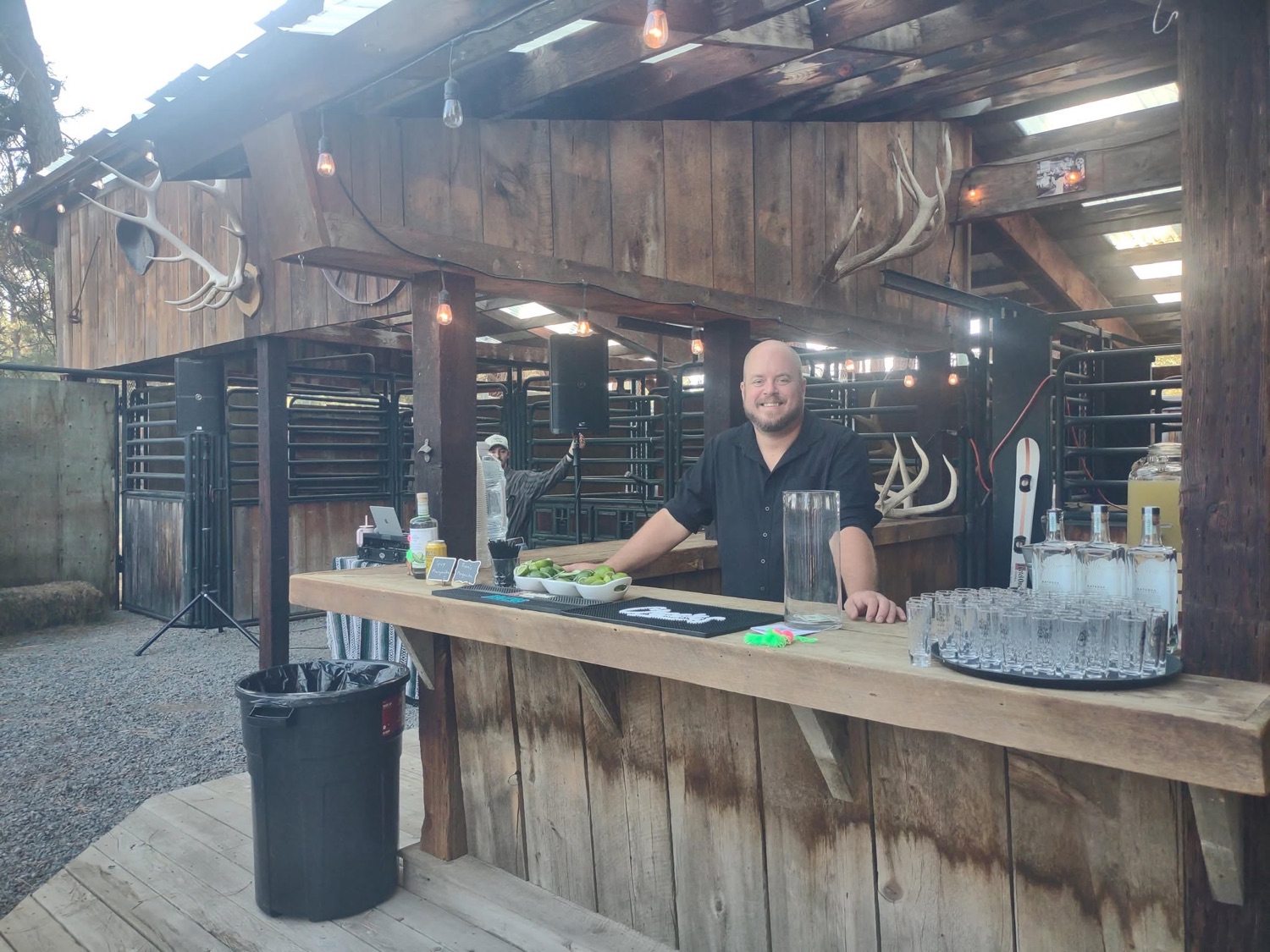 Sips mobile bartender behind an outdoor mobile bar setup at a Central Oregon venue